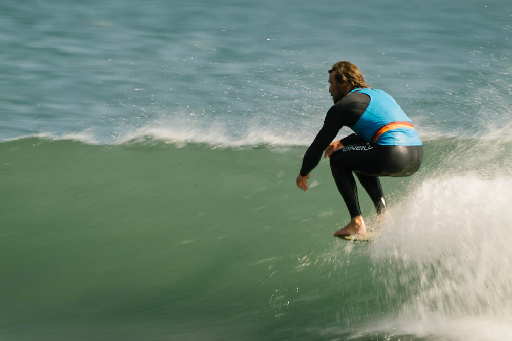 Ben Skinner Surfing Longboard